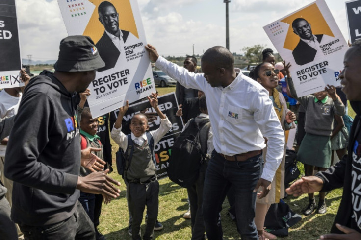 Songezo Zibi (R) believes that with relentless campaigning his Rise Mzanzi party can reach five percent in South Africa's upcoming elections