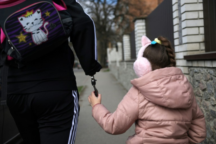 Kucherenko with his eldest daughter, six-year-old Valeria