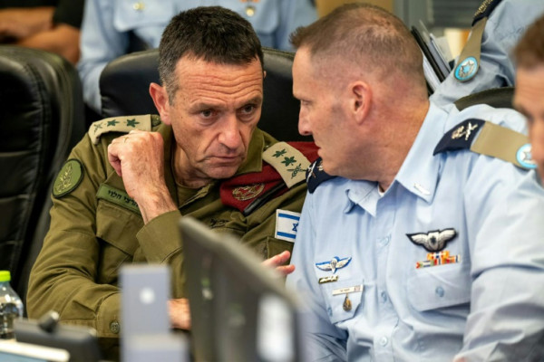 Israeli army chief General Herzi Halevi (L) warned Iran's attack at the weekend would be 'met with a response'