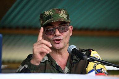 EMC commander Ivan Mordisco speaks during a meeting with local communities in San Vicente del Caguan, Caqueta department, Colombia, on April 16, 2023
