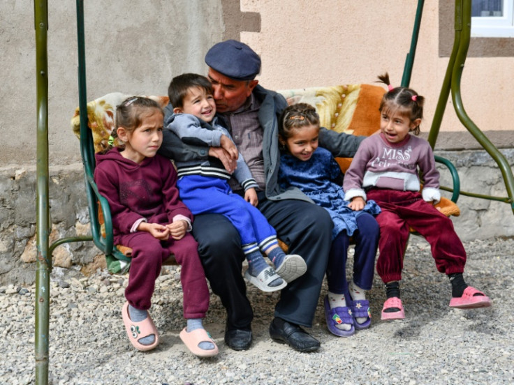 Many retirees in Tajikistan look after their grandchildren, whose parents have left to earn money in Russia