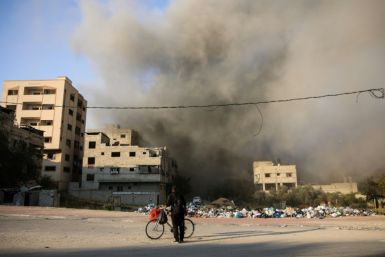 A plume of smoke rises after Israeli bombardment in Gaza City amid ongoing battles between Israel and the Palestinian Hamas movement
