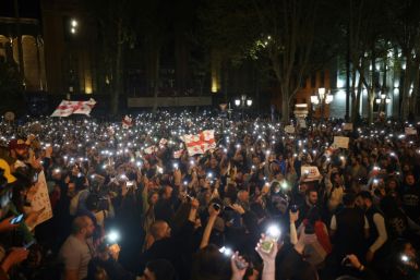 Protesters gathered outside parliament on Tuesday night