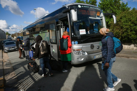 Buses waited outside, ready to take them to the central city of Orleans or the southwestern city of Bordeaux