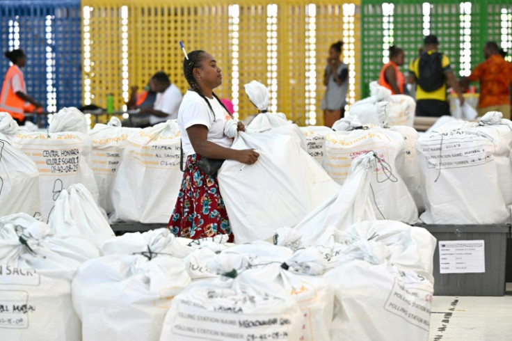 Hand counting the paper ballots is only the start of an arduous election process in Solomon Islands