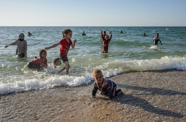 Many Gazans at the beach have been displaced by the war between Israeli forces and Hamas militants