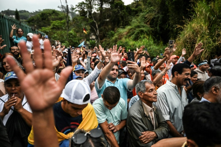 Supporters of Venezuelan opposition leader Maria Corina Machado attend a rally in San Antonio de los Altos