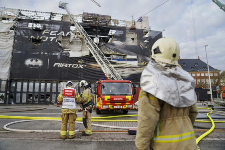 The fire began under the copper roof of the building, which was undergoing renovations ahead of its 400th anniversary