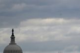 The dome of the US Capitol is seen on a cloudy day in Washington, DC in January 2024