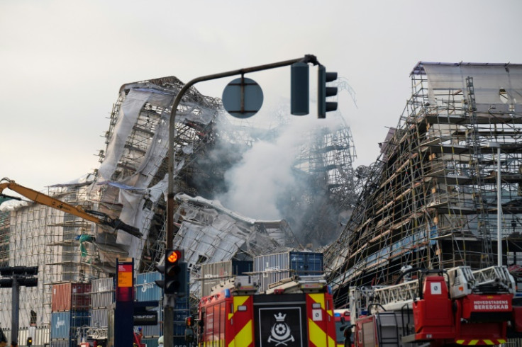 The fire began Tuesday morning under the copper roof of the building, which was undergoing renovations ahead of its 400th anniversary.