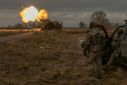 Ukrainian members of the 45th Artillery Brigade fire toward Russian positions in the Donetsk region on January 20, 2024