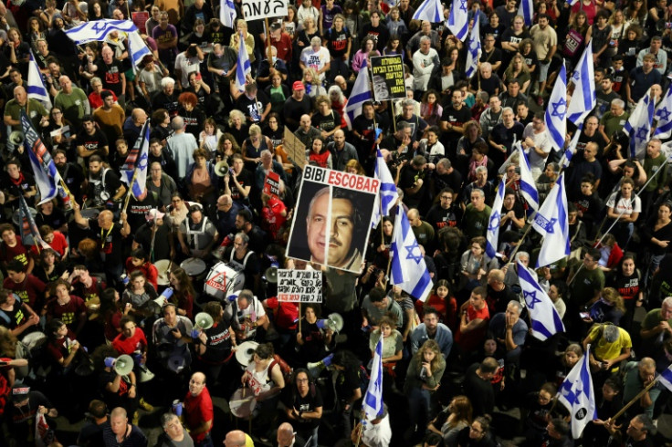 Families of the hostages were among those attending an anti-government protest in Tel Aviv