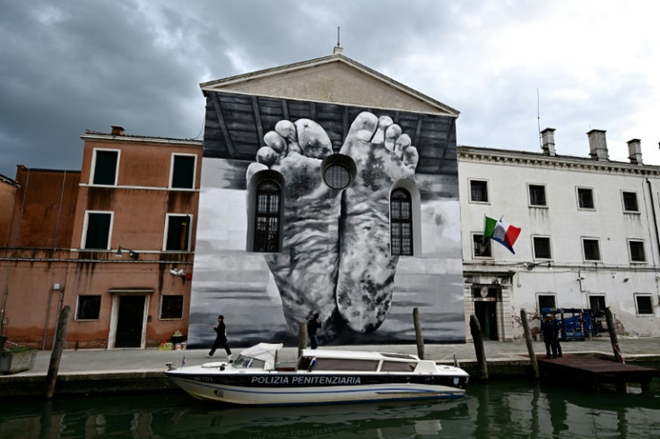 This mural by artist Maurizio Cattelan adorns Giudecca Women's Prison