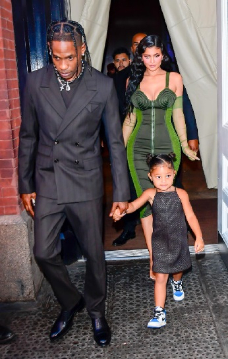 Travis Scott with Kylie Jenner and their daughter