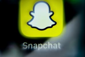 Snap chief Evan Spiegel says improved ad systems at Snapchat and the social network's 'hard to reach' young users make it attractive to businesses