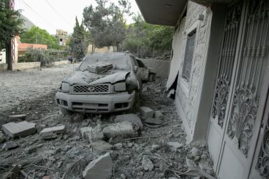 Rubble litters the area around a house hit by an Israeli air strike in the southern Lebanese village of Shebaa