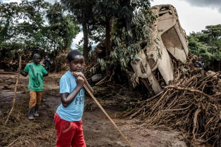 Flattened homes, uprooted trees, and overturned vehicles testified to the severity of the deluge
