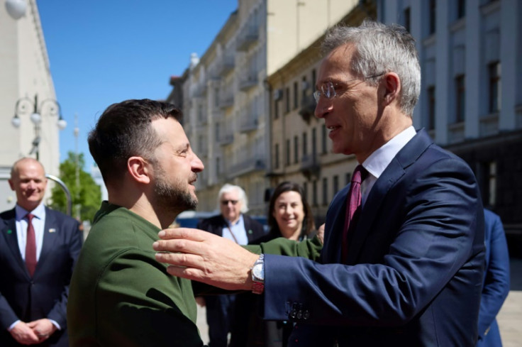 Ukraine President Volodymyr Zelensky (L) has urged allies to send more weapons faster to 'disrupt the Russian offensive'