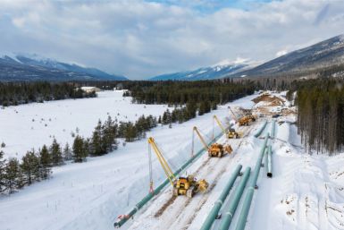 This December 9, 2021, image courtesy of Trans Mountain Corporation shows winter pipeline construction work in Valemount, British Columbia, Canada. The first major new pipeline to be built in Canada in decades is set to open on May 1