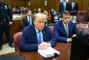 Former US president Donald Trump and his attorney Todd Blanche in court