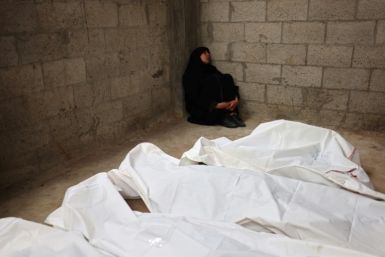 A Palestinian woman mourns relatives killed in Israeli bombardment, at the al-Najjar hospital in Rafah in the southern Gaza Strip, on April 29, 2024