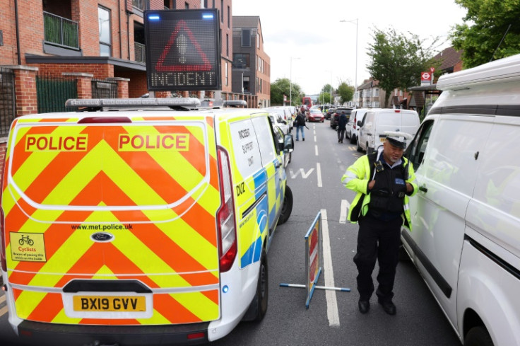 A 13-year-old boy was killed and four other people were injured by a man wielding a sword in Hainault, east London