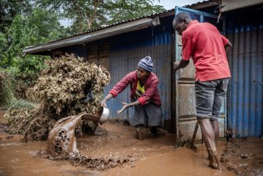 A makeshift dam burst in Kenya's Rift Valley, sending torrents of water and mud gushing down a hill