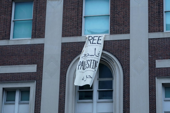 A 'Free Palestine' banner hangs on a Columbia University building on April 30, 2024