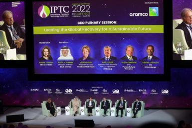 Scott Sheffield, shown here on a February 2022 panel with the CEO of Saudi Aramco, will be barred from the ExxonMobil board under a proposed consent order by the Federal Trade Commission