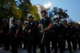 Police officers moved deliberately and slowly to clear a protest camp at UCLA