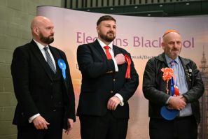 New Labour Party MP for Blackpool South, Chris Webb (C) reacts as his win is announced