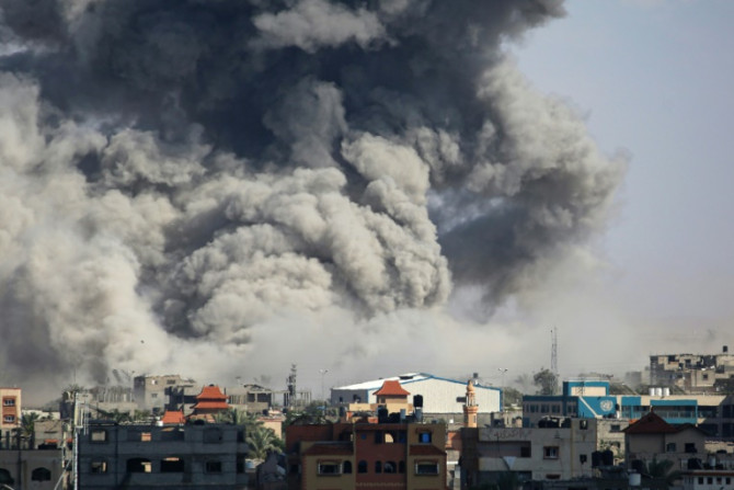 Smoke billows following Israeli bombardment in Rafah, after an evacuation order was issued for the Gazan city's east