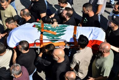 The funeral of Reuters journalist Issam Abdallah, killed in an attack by an Israeli tank in southern Lebanon in October that also wounded two AFP journalists