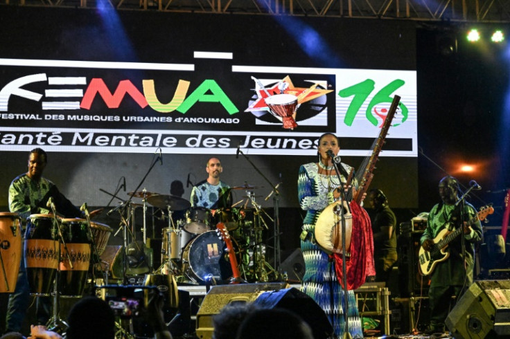 Jobarteh comes from a family of Gambian griots, widely respected musical storytellers who pass on West African traditions