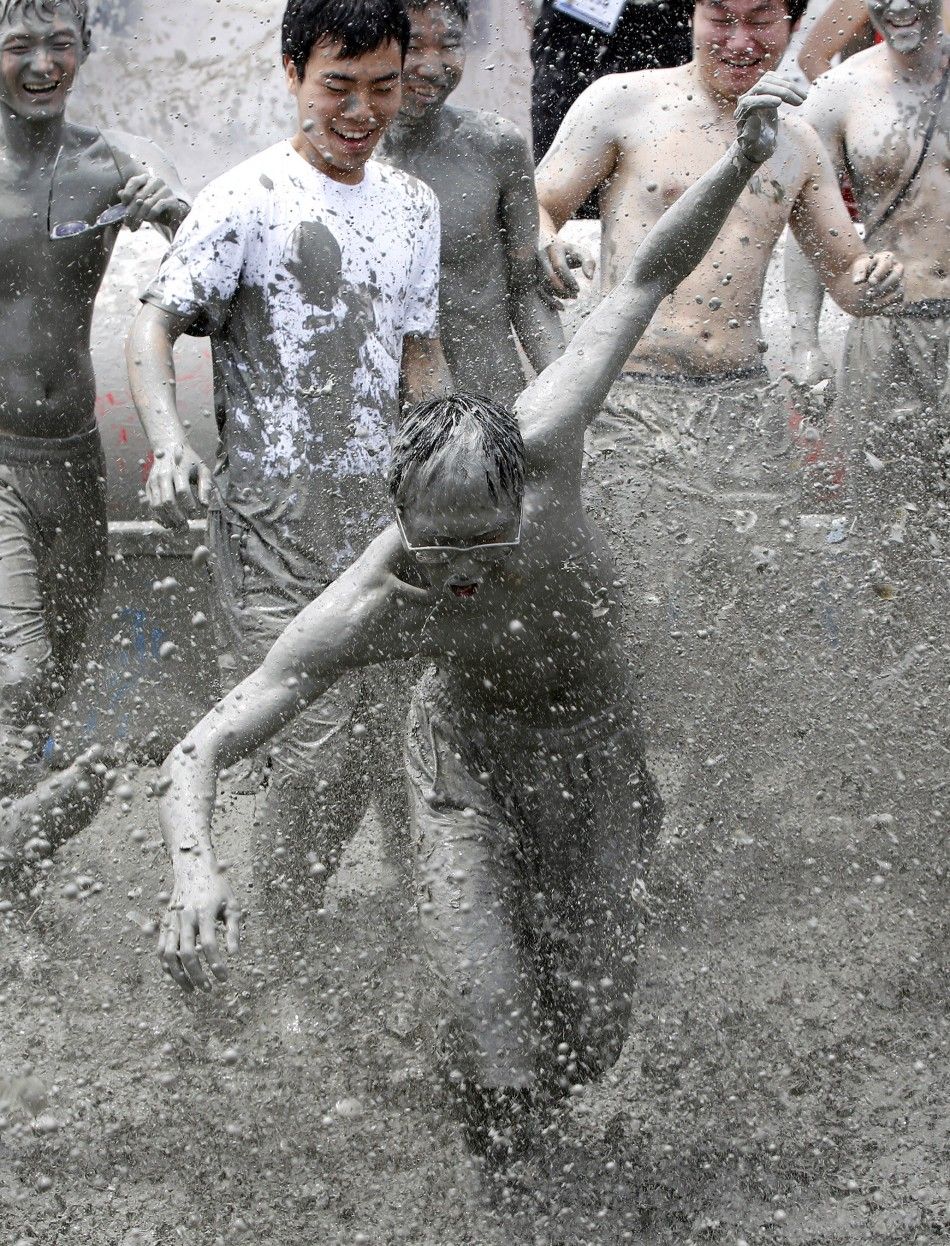 Spectacular Images of the 14th Boryeong Mud Festival in Korea.