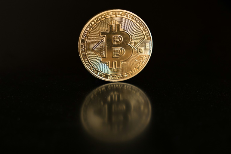 https://d.ibtimes.com/en/full/4543509/this-photo-illustration-shows-physical-representation-bitcoin.jpg