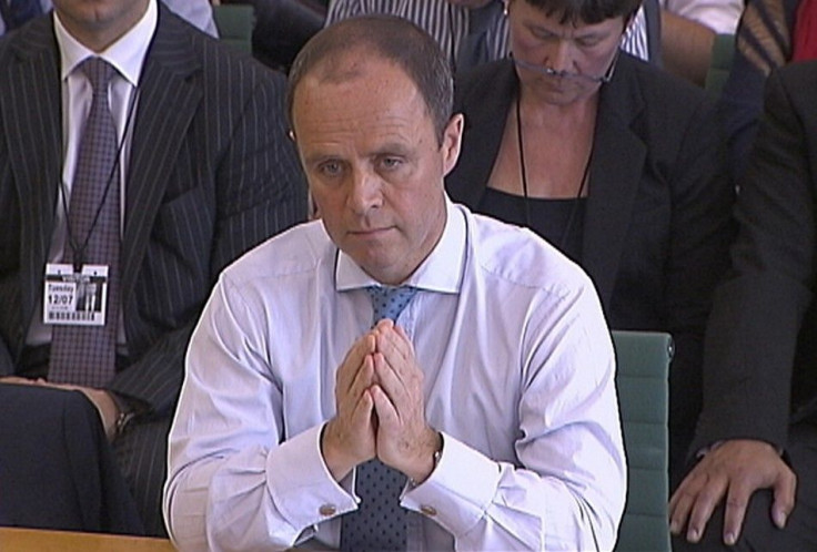 Metropolitan Police assistant commissioner John Yates appears before a parliamentary hearing into phone hacking in London