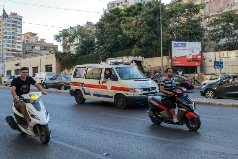 https://d.ibtimes.com/en/full/4548800/lebanese-red-cross-ambulance-rushes-wounded-people-hospital-beirut-after-explosions-hit.jpg