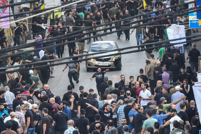 https://d.ibtimes.com/en/full/4549140/people-beiruts-southern-suburbs-react-after-reported-explosion-during-funeral-those-killed.jpg