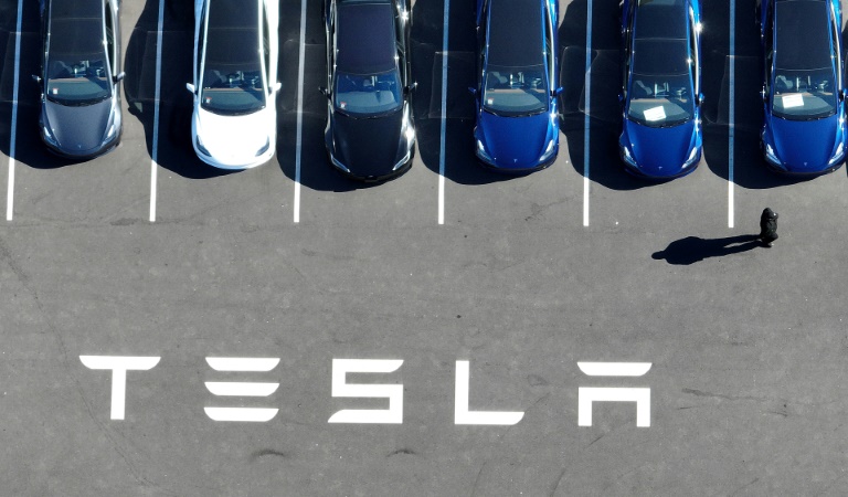 https://d.ibtimes.com/en/full/4550193/tesla-cars.jpg