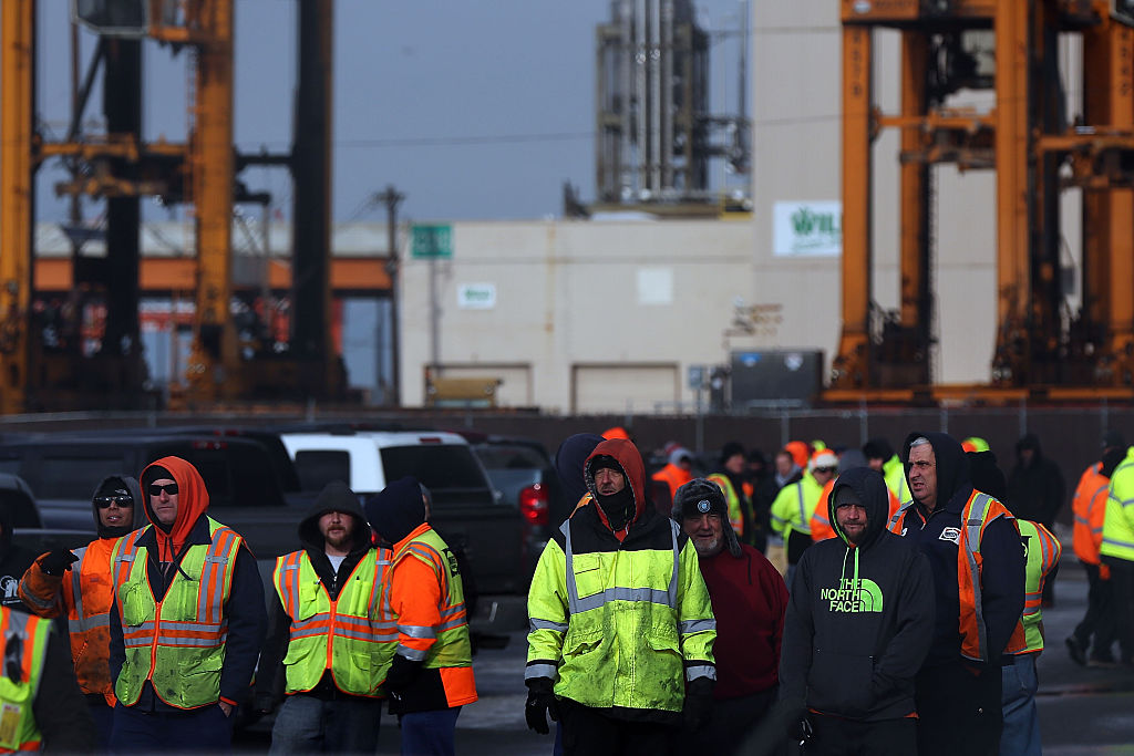 https://d.ibtimes.com/en/full/4550903/dockworkers-strike.jpg