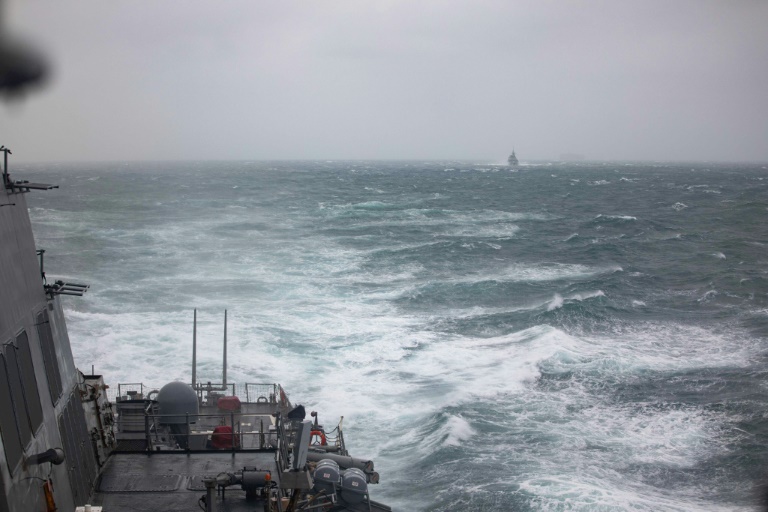 https://d.ibtimes.com/en/full/4555541/handout-photo-taken-october-20-us-navy-shows-uss-higgins-foreground-royal-canadian-navy.jpg