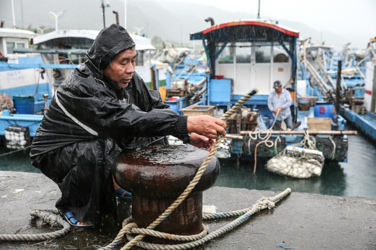 https://d.ibtimes.com/en/full/4557744/fisherman-secures-boat-typhoon-kong-rey-approaches-taiwans-yilan-county-wednesday.jpg