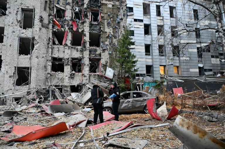 https://d.ibtimes.com/en/full/4560238/police-examine-commercial-office-buildings-damaged-after-russian-strike-kharkiv.jpg