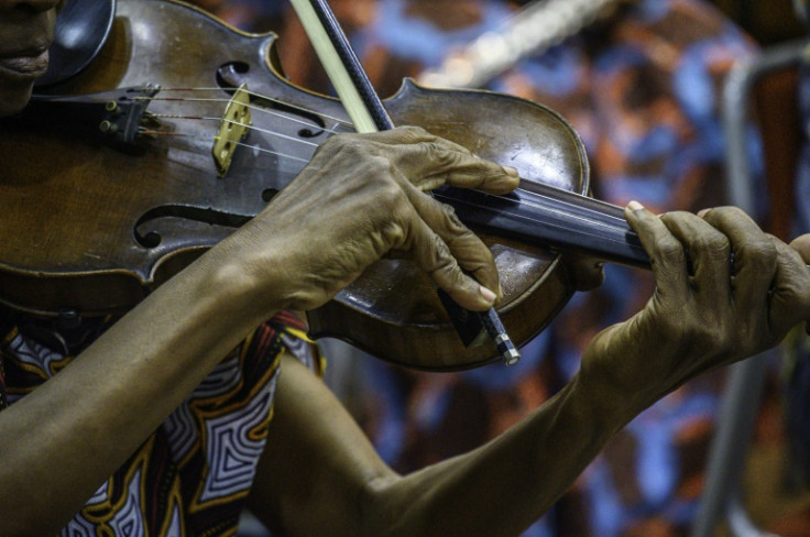 At first, musicians in the Kimbanguist Symphony had to share rare instruments, and some could not even read music