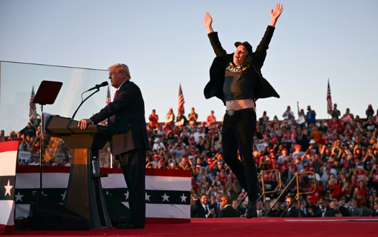 https://d.ibtimes.com/en/full/4561505/tesla-spacex-ceo-elon-musk-exults-during-donald-trump-rally-pennsylvania-october-2024-pair.jpg