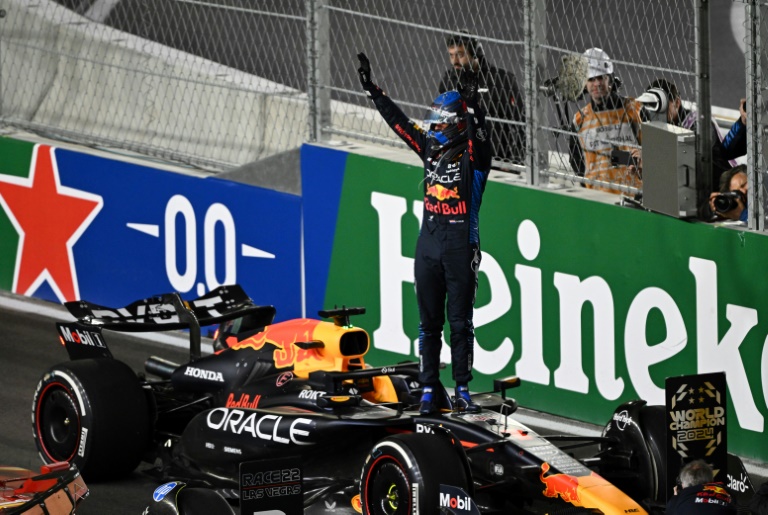 https://d.ibtimes.com/en/full/4565141/red-bull-racings-max-verstappen-celebrates-winning-his-fourth-consecutive-formula-one-world-title.jpg