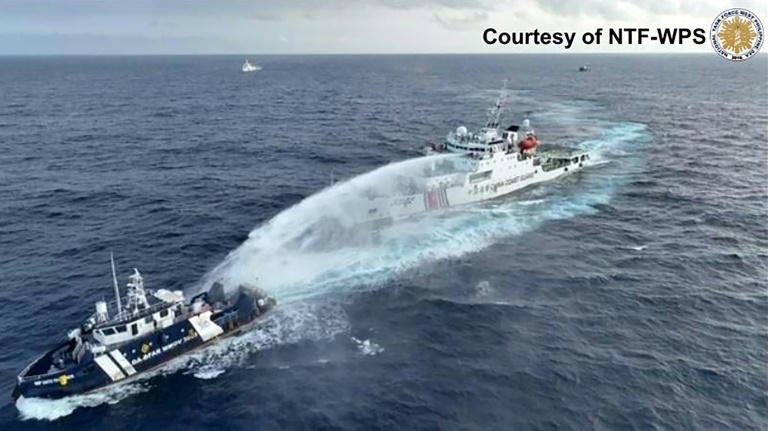 https://d.ibtimes.com/en/full/4566463/china-coast-guard-ship-seen-deploying-water-cannon-phillipines-fisheries-department-vessel.jpg