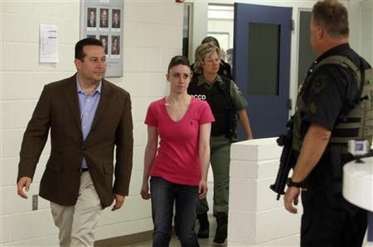 Casey Anthony and her lawyer Jose Baez (L) leave the Orange County Jail in Orlando, Florida