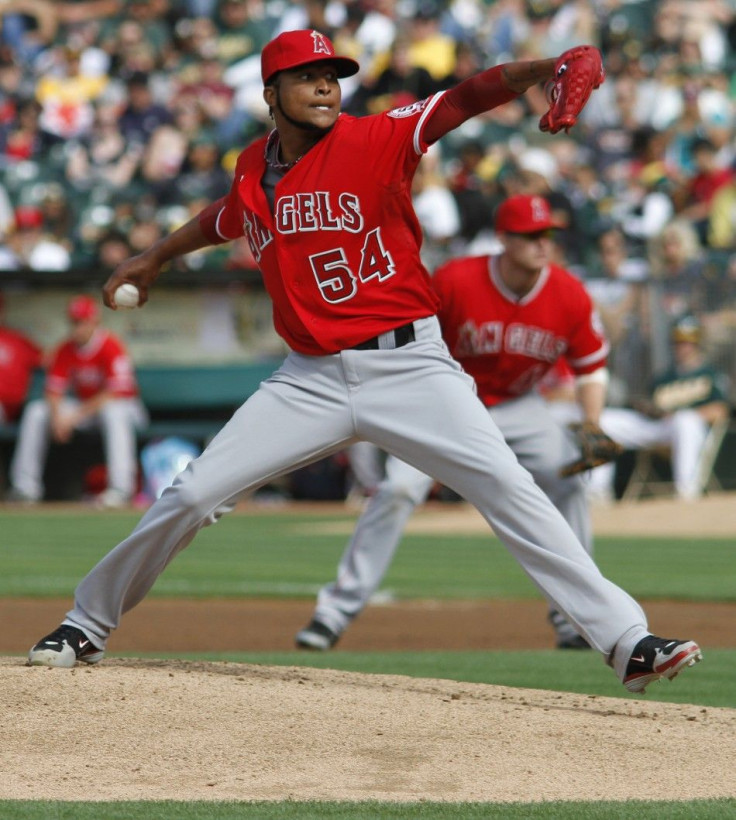Los Angeles Angels starting pitcher Ervin Santana throws in the first inning against the Oakland Athletics during the second game of their MLB American League baseball doubleheader in Oakland, California